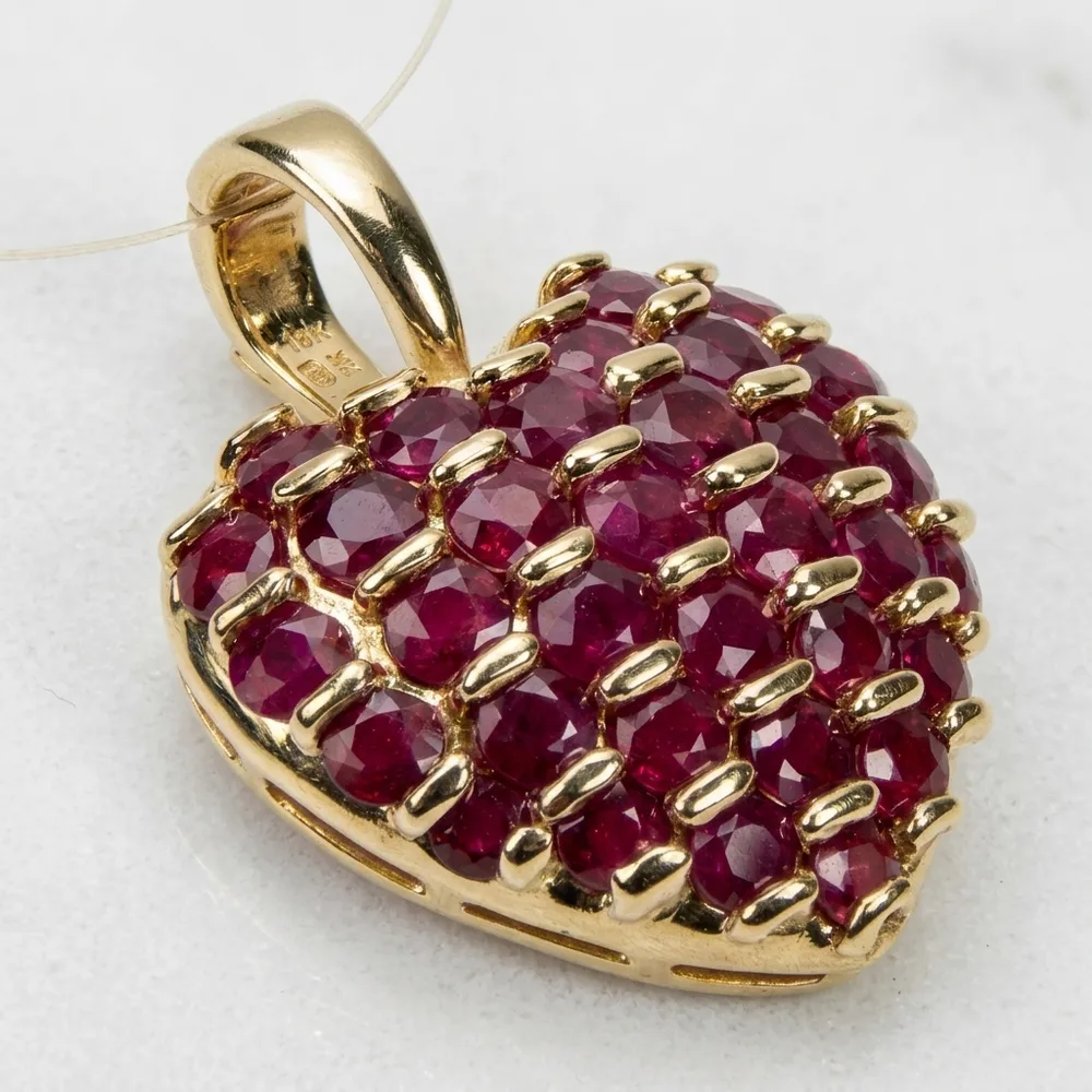 18K gold heart pendant pavé-set with rubies, cast from CAD file